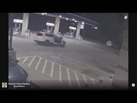Video shows armed man stealing a car with woman still inside at gas station on the Northwest Freeway