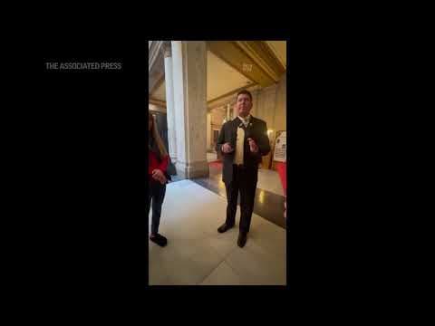 Video shows Indiana lawmaker showing holstered gun to students who were advocating for gun control