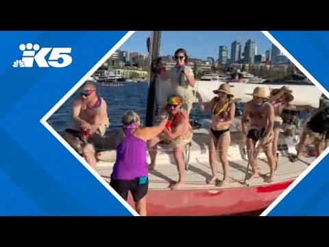 As 'Duck Dodge' sailing race turns 50, hundreds turn out for tropical-themed event on Lake Union