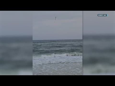 Fisherman uses drone to save girl swept up in a riptide in Florida