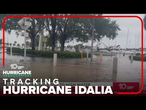 Tracking the Tropics: Cars sunk, piers closed due to rising waters.