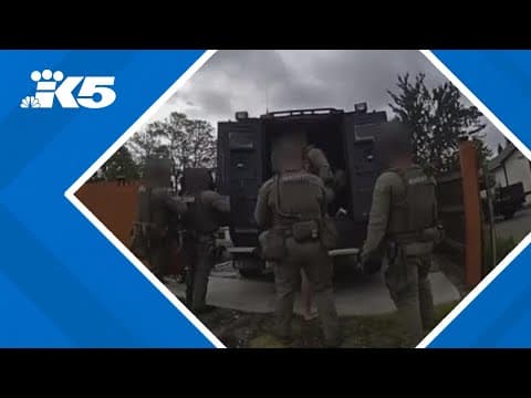 New video shows arrest of man accused of killing his father and brother