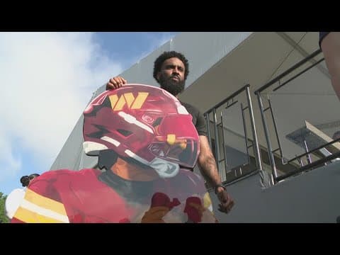 Artist crafts 5-foot cutout of Jayden Daniels, delivers it to the QB at training camp