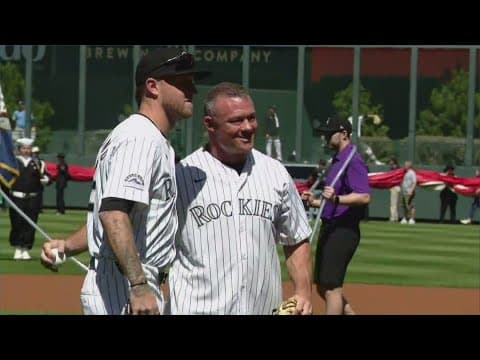 Denver sergeant injured at Nuggets parade throws first pitch at Rockies game