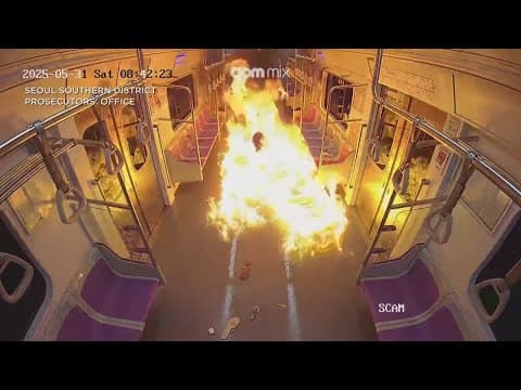 Surveillance video shows man dumping gasoline, setting train on fire in Seoul