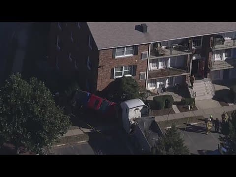5 hurt after truck, tractor-trailer smash into condo building