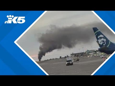 Large fire burning north of SEA Airport