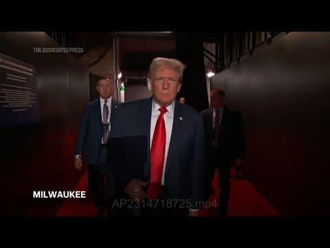 Donald Trump enters Republican convention hall with gauze covering his ear