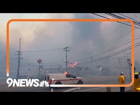 Smoke from the Palisades fire blankets nearby streets as fire crews work to contain it