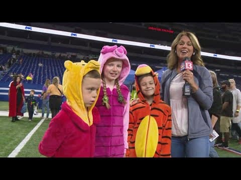 Angela Buchman visits with kids at the Colts' 'For the Boo!' Halloween party