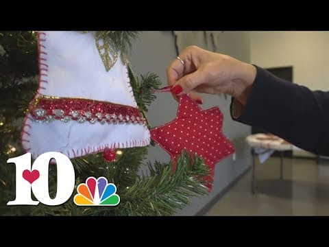 One Vision International selling handmade ornaments stitched with love