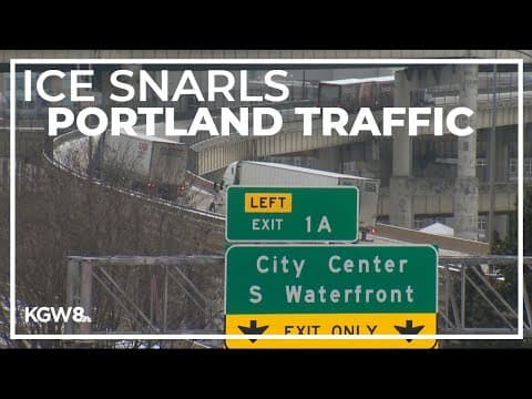 Semi-trucks and buses stuck during icy morning commute