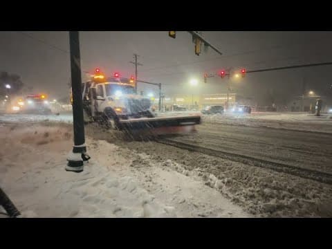 Crews in Vienna work to clear the roads
