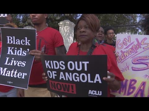 Crowd gathers to applaud removal of juveniles from youth area at Angola prison