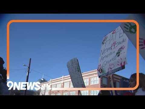 2 arrested after glass thrown at protesters