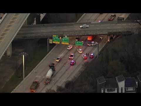Raw video: 18-wheeler hits bridge on Katy Freeway, loses container near Houston Avenue