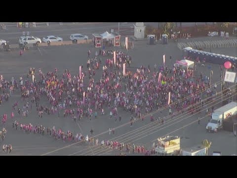 Chopper 8 flies over start of Susan G. Komen 3-Day walk