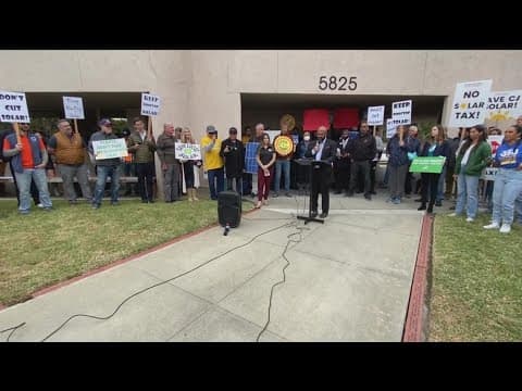 Environmental advocates, solar workers rally against rooftop solar proposal