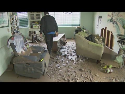 San Diego Storm Clean Up | Residents remove layers of mud from streets and houses