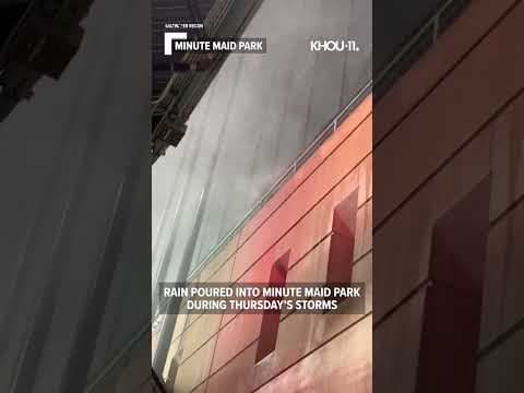 Rain pours into Minute Maid Park during Thursday's storms, despite roof being closed #shorts