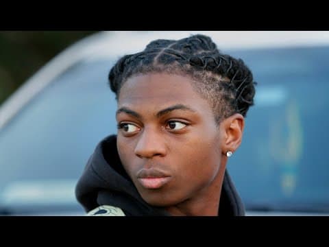 He was suspended for his hair. When he returned with the same hairstyle, he was suspended again