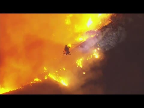 Wildfires still rage as California winds calm