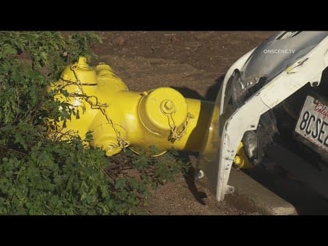 Apartments flooded after car crashes into fire hydrant
