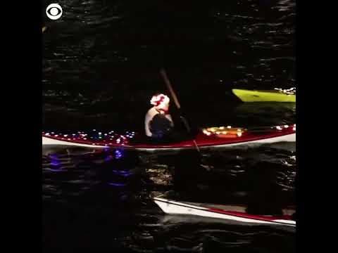 Kayaks light up canals in Denmark for Saint Lucia's Day #shorts
