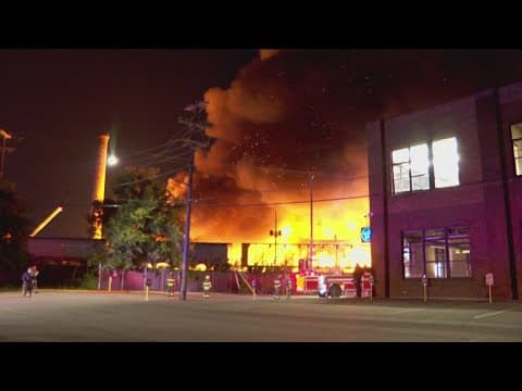 Multi-alarm fire burns commercial buildings in Minneapolis