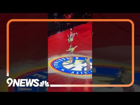 ZUZU Acrobats perform at halftime of Denver Nuggets game