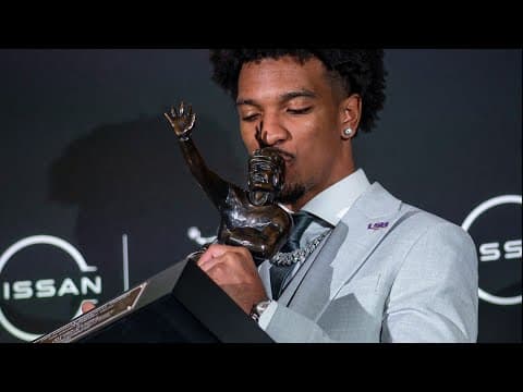 Jayden Daniels says he slept next to the Heisman the night he won the award