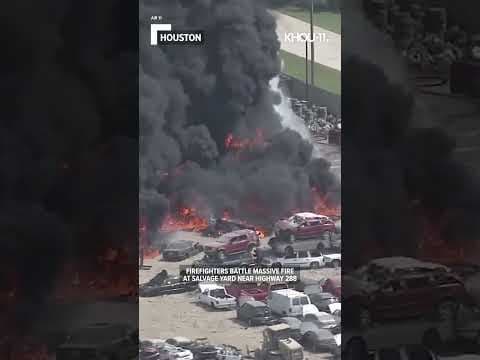 Video shows firefighters battling massive fire at Houston salvage yard #shorts