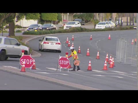 Crews clean up gasoline after fuel truck overturns in El Cajon last month