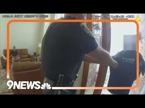 Video captures Douglas County deputy putting hand around throat of handcuffed man