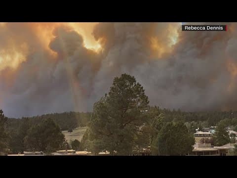 Two deadly wildfires converge in New Mexico as state's governor declares state of emergency