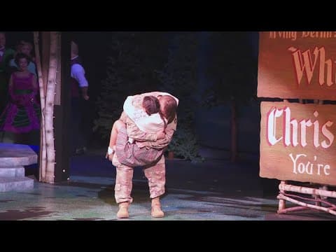 Young girl surprised by her stepfather returning from deployment