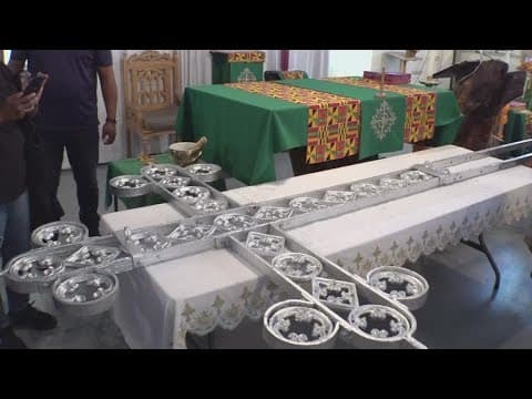 Historic Tremé church in New Orleans has cross restored after it was damaged in Hurricane Ida