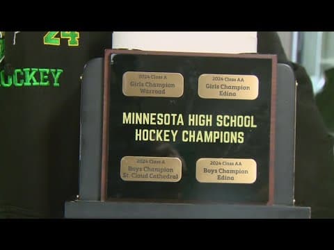 Lou Nanne presents state hockey trophies to Edina teams