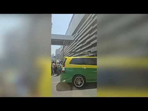 People Evacuate Onto Bangkok Street Following Earthquake