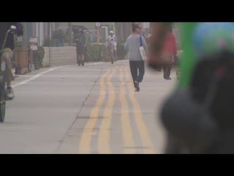 Wavy yellow lines on Mission Beach boardwalk draw attention and criticism