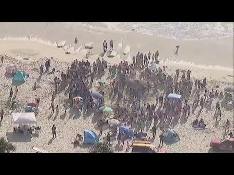 San Diego lifeguards rescue girl trapped under sand at Mission Beach