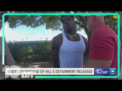 Video shows that officers dragged Tyreek Hill out of his car after he put his window back up