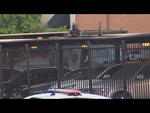 Dallas police in standoff with suspect firing shots near SMU