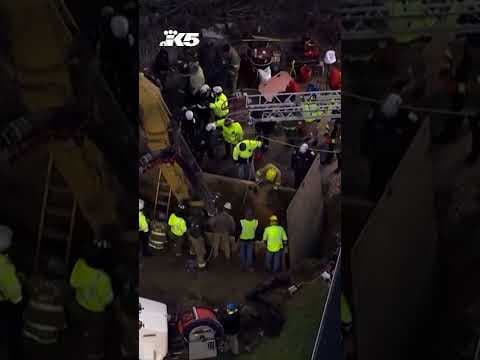 Rescuers search for grandmother believed to have fallen into a sinkhole