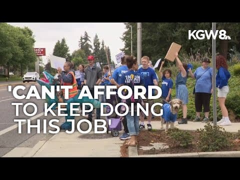 Evergreen Public Schools workers rally outside of district headquarters as contract expires