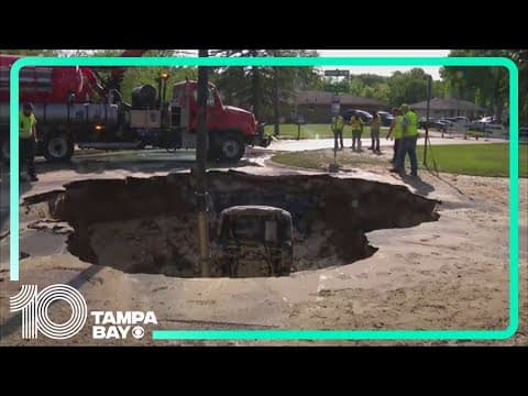 Car sinks into large sinkhole in Minnesota