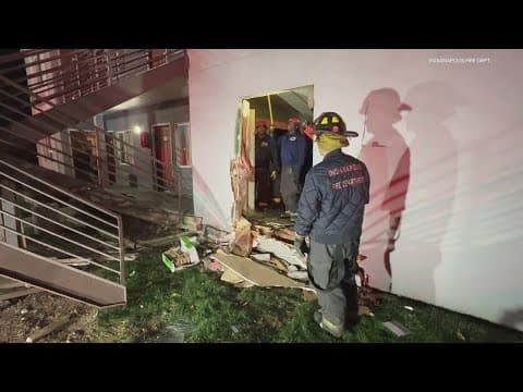 Truck crashes into northeast side apartment