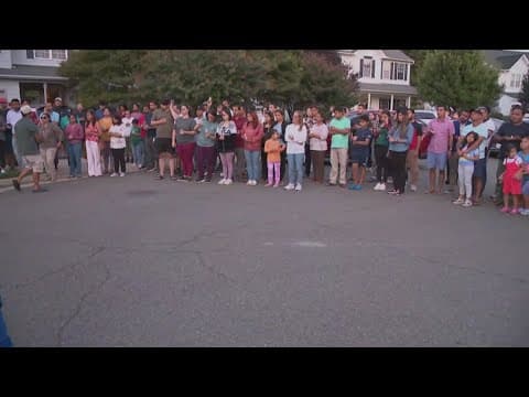 Community holds a vigil outside Mamta Kafle Bhatt's home, hours after her husband's arrest