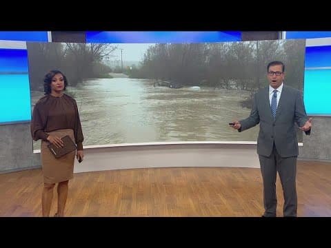 Fire crews find an abandoned vehicle stuck in Tijuana River in San Ysidro