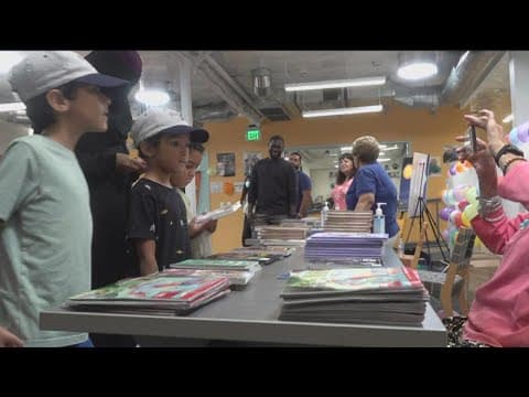 Kids receive hundreds of books at first literacy festival in Barrio Logan